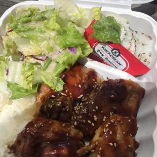 Daily special of sesame chicken with California roll