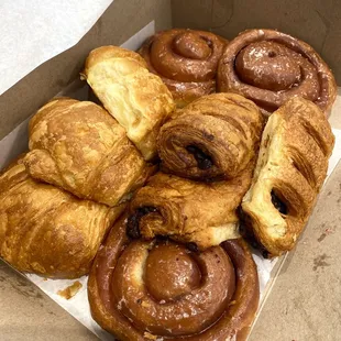 IG: eatswithnc Variety box with: Plain Croissant, Chocolate Bar, Cinnamon Roll