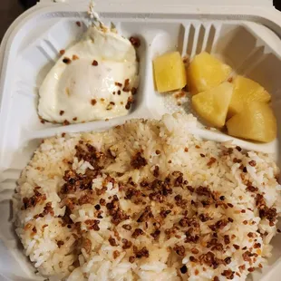 Egg, garlic rice, pineapple