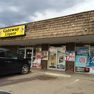a car parked in front of the store