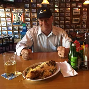 The Dirty Sanchez!   1 foot Corn dog smothered in Chili!