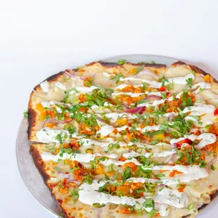 Patatas Brava
Oil Base, Roasted Potato, Red Pepper, Onion, Fresh Mozzarella, Romesco, Cilantro, Lime Crema, Green Onion