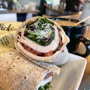 TURKEY &amp; BACON RANCH WRAP $10 turkey, bacon, tomato, lettuce, swiss cheese, ranch, whole grain wrap, served with chips