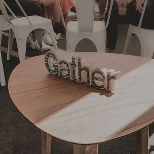 a group of people sitting around a table