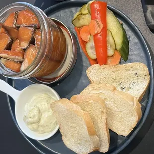 Tinned Wild Alaskan classic salmon paired with aioli, crostini and pickled vegetables