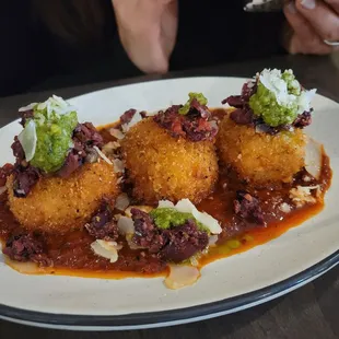 Arancini - marinara, shaved parm, basil, pesto, olive tapenade