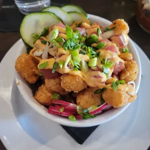 Sushi Tots - diced tuna, seasoned tots, spicy mayo, eel sauce, scallions, pickled cucumber