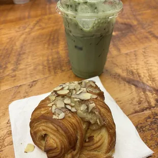 Almond croissant and a iced matcha latte