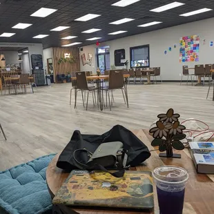 a room with tables and chairs