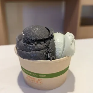 two scoops of ice cream in a cup