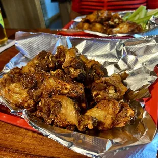 a plate of chicken wings
