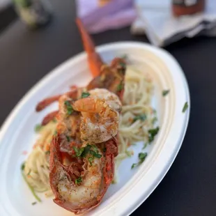 a plate of pasta and shrimp