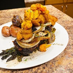 Steak Stacker Fried Shriml Lobster sauté onions w/ aparagus