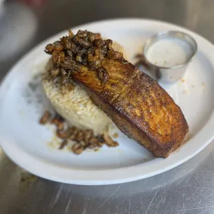 Crawfish Butter Sauce tipped Blackened Salmon w/ coconut white rice