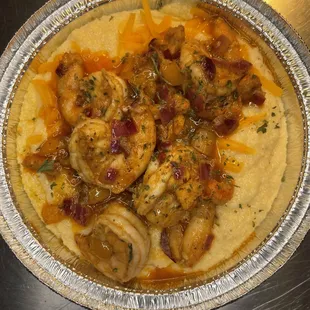 Shrimp Grits Sharp cheddar &amp; cajun sauce