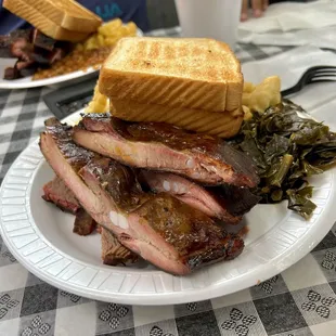 a plate of meat and a sandwich
