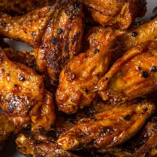 a plate of chicken wings