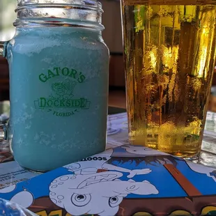 a glass of beer and a jar of ice cream