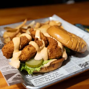 a plate of fried fish and fries