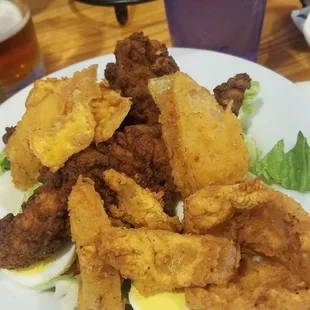 Look at my healthy salad! Lol! Fried chicken salad topped with onion rings!