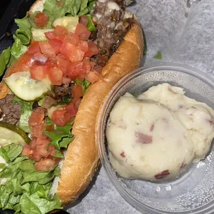 Steak Philly Cheesesteak with a side of Garlic Mashed Potatoes