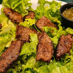 Steak bites on a bed of lettuce instead of bread. Also subbed the cajun sauce for chimichurri sauce - $11.99