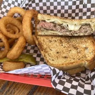 The patty melt and onions rings look a lot better than they were.