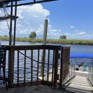 a view of a dock and a lighthouse