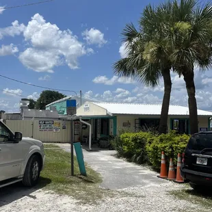 a car parked in front of a restaurant