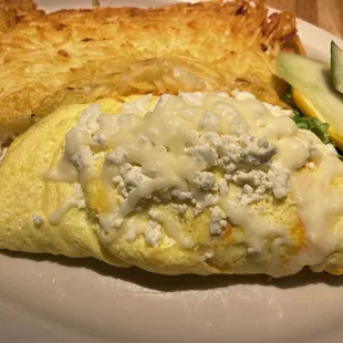 an omelet with blue cheese