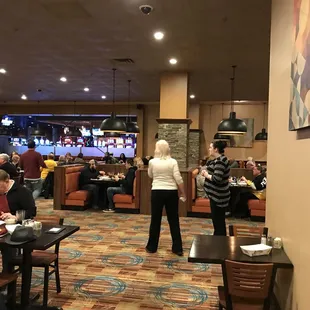  group of people sitting at tables