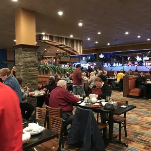  large group of people sitting at tables