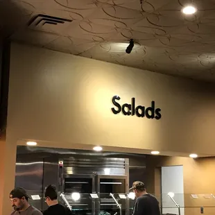  group of people in a kitchen