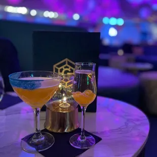 two cocktails on a table