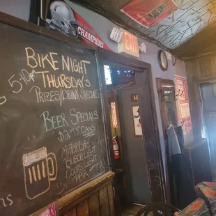 a blackboard with a chalkboard saying bike night