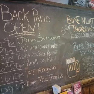 a blackboard with a list of drinks
