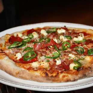 The New World Pepperoni pizza blew us away - it was so good and a must order when dining at Gattara.