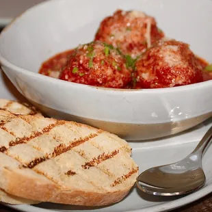 The Meatballs Bolognaise were made with  tomato conserva, grana padano, and served alongside grilled ciabatta.