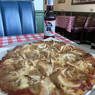 Sausage and onion small pie.