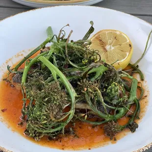 Sea bass with broccolini and a side of gaucho salad