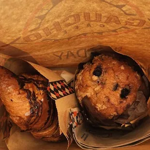 (Left) chocolate croisant (right) blueberry muffin