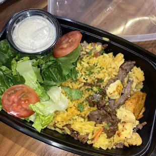 Brazilian rice with steak and chicken