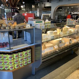 a display of cheeses and pastries