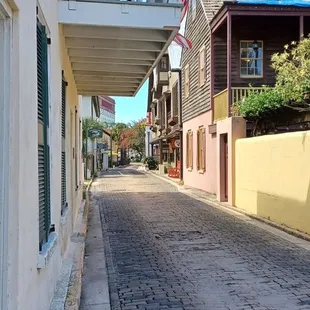 a cobblestone street in a town