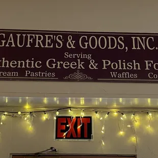 a sign above the entrance