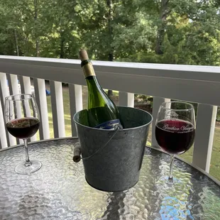 a glass of wine and a bottle of wine