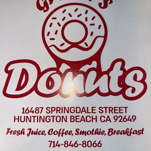 a sign for a donut shop