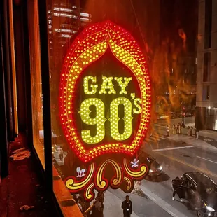Iconic Gay 90's Sign adores the front entrance