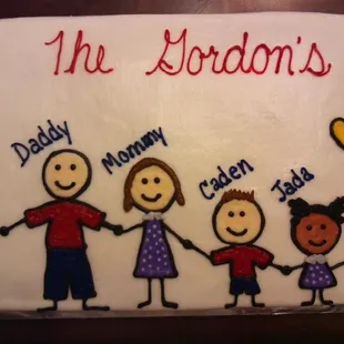 a cake with a family picture on it