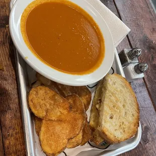 a bowl of soup and toast